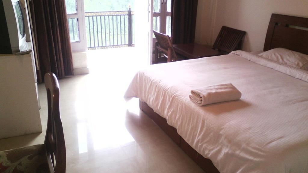Hotel Cozy Swiss Meadows à Khajjiar Chambre photo